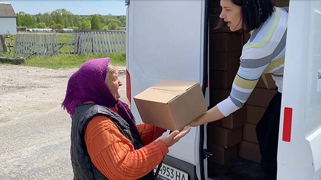 iLoveUkraine volunteer delivering aid near Kyiv, Ukraine.